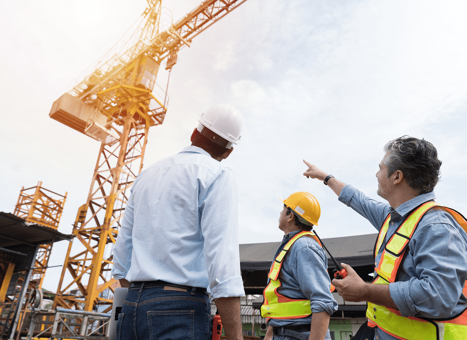 Engineers discussing at construction site